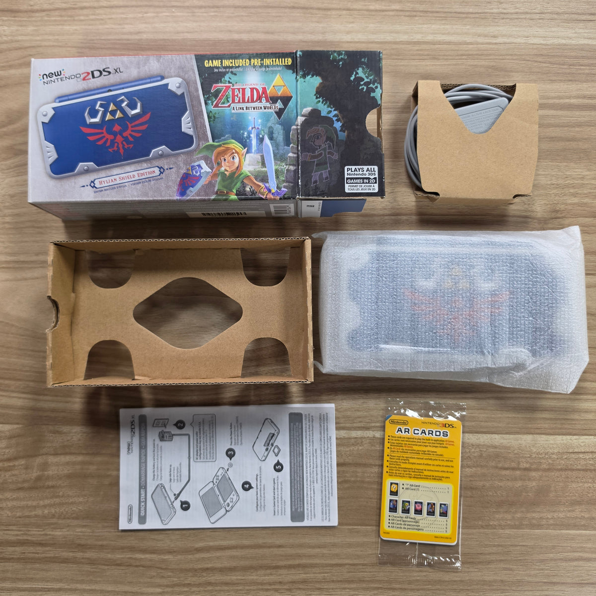 New Nintendo 2DS XL Zelda Hylian Shield Handheld Console (CIB)